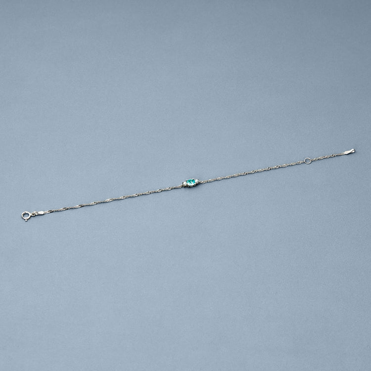 Stone and Strand 14K White Gold Delicate Aquamarine Cushion Bracelet Editorial Image