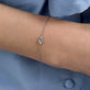 Image of 14K White Gold Delicate Aquamarine Cushion Bracelet on Models Arm