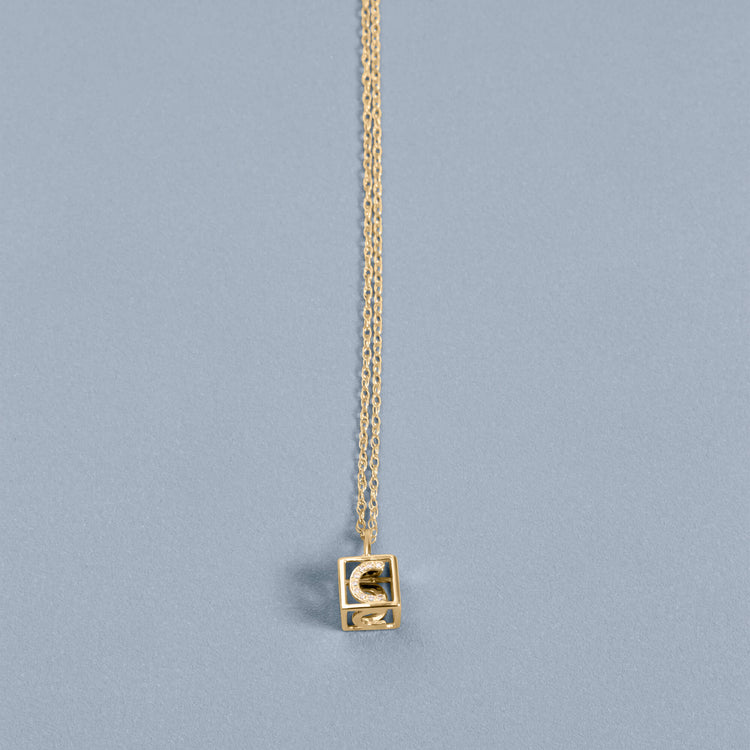 Stone and Strand 10K Yellow Gold Diamond Baby Block Necklace Editorial Image