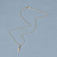 Stone and Strand 14K Yellow Gold Diamond Baguette Charm Editorial Image