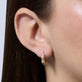 Image of 14K Yellow Gold Diamond Bamboo Resort Hoops on Models Ear