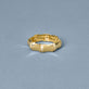 Stone and Strand 14K Yellow Gold Diamond Bamboo Eternity Ring Editorial Image