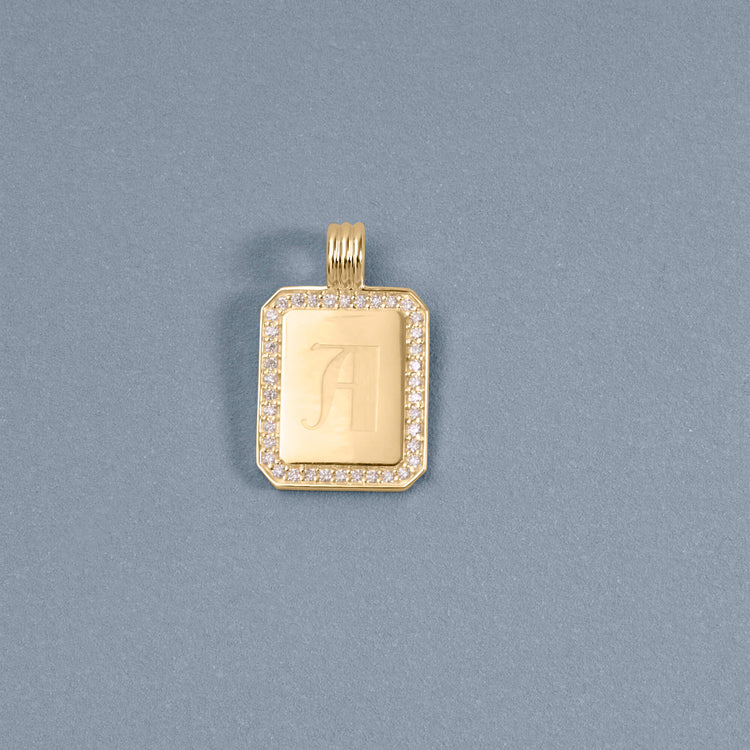 Stone and Strand 14K Yellow Gold Diamond Beekman Dog Tag Necklace Editorial Image