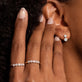 Model wearing Small Diamond Burst Dangle Earrings with solid gold Stone and Strand jewelry