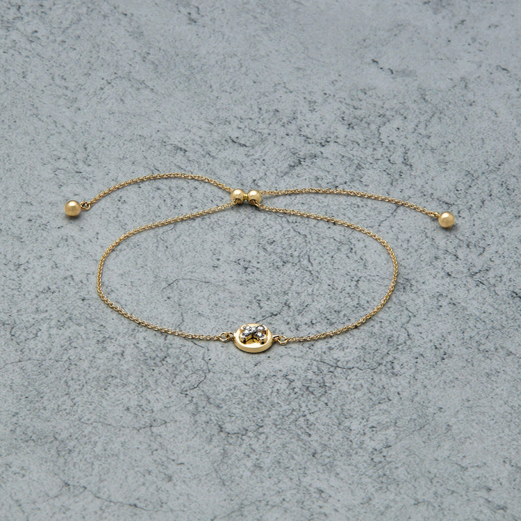 Stone and Strand 14K Yellow Gold Diamond Button Bracelet Editorial Image