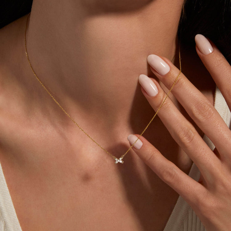 Image of 14K Yellow Gold Diamond Cross Stitch Necklace on Models Necklace