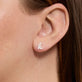 Image of 14K Yellow Gold Diamond Cursive Initial Stud on Models Ear