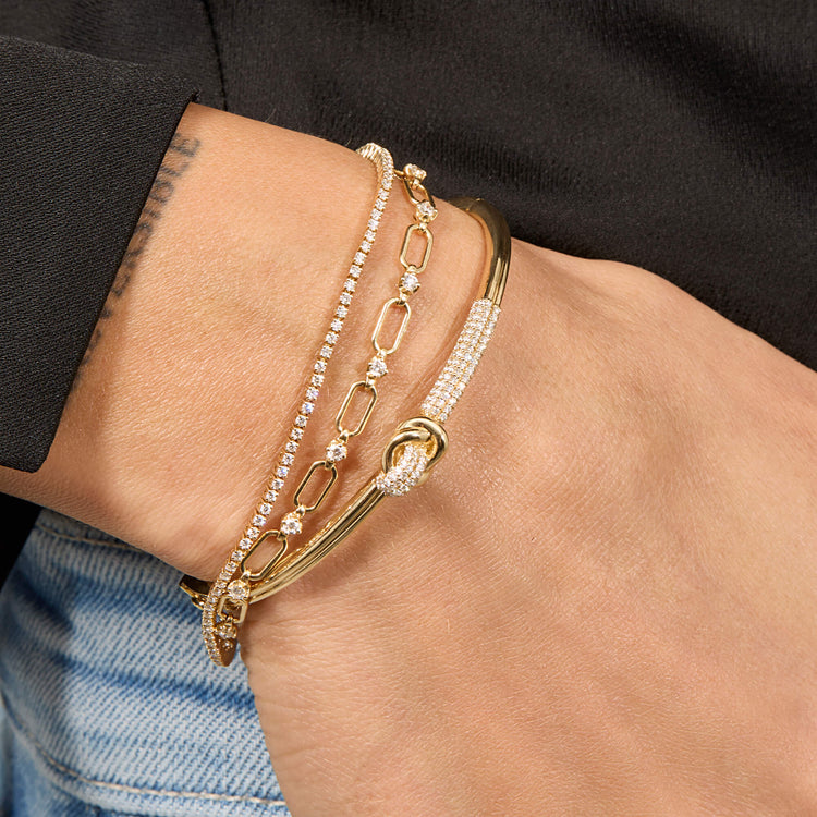 Image of 14K Yellow Gold Diamond Forme Knot Bangle with Stone and Strand Bracelets