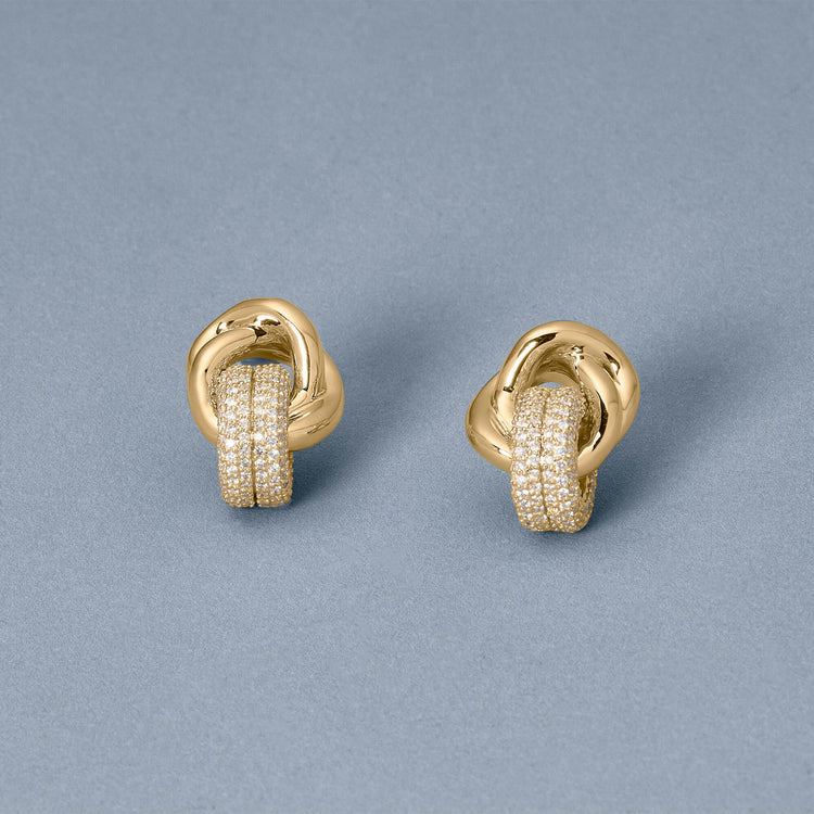 Stone and Strand 14K Yellow Gold Diamond Forme Knot Earrings Editorial Image