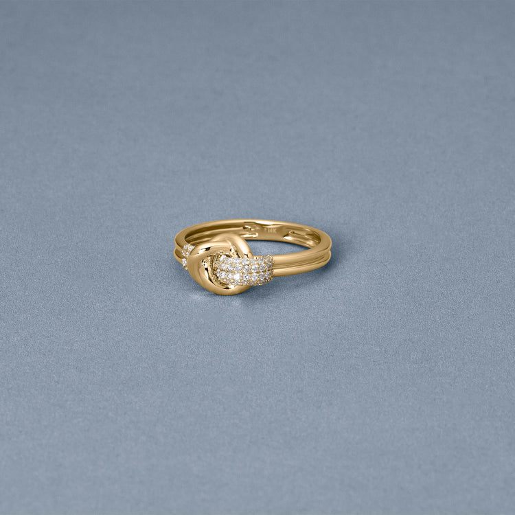 Stone and Strand 14K Yellow Gold Diamond Forme Knot Ring Editorial Image