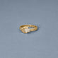 Stone and Strand 14K Yellow Gold Diamond Forme Knot Ring Editorial Image