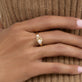 Image of 14K Yellow Gold Diamond Forme Knot Ring on Models Hand