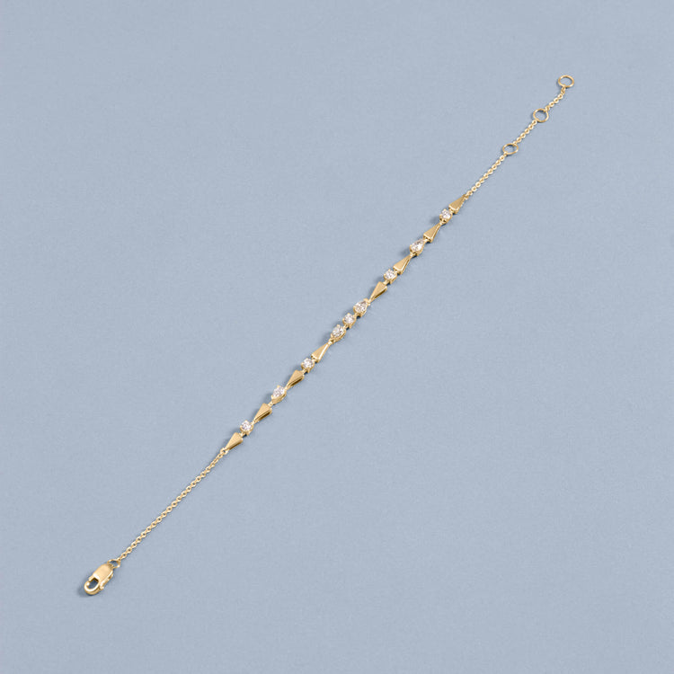 Stone and Strand 10K Yellow Gold Diamond Gold Link Bracelet Editorial Image