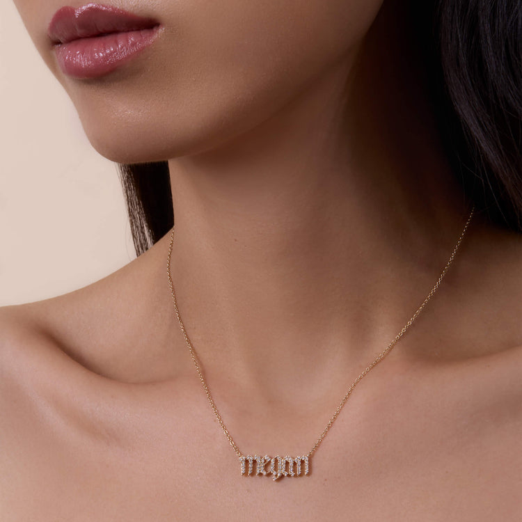 Image of 14K Yellow Gold Diamond Gothic Name Necklace on Models Neck