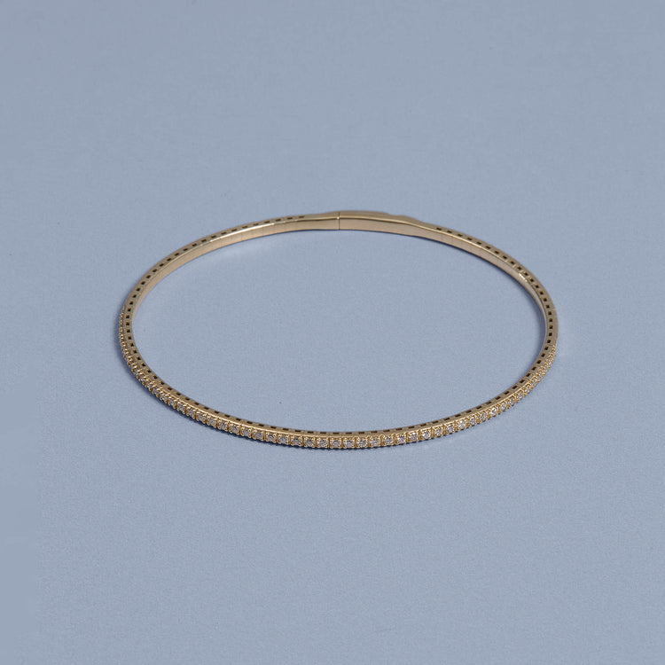 Stone and Strand 14K Yellow Gold Diamond Line Flex Bangle Editorial Image