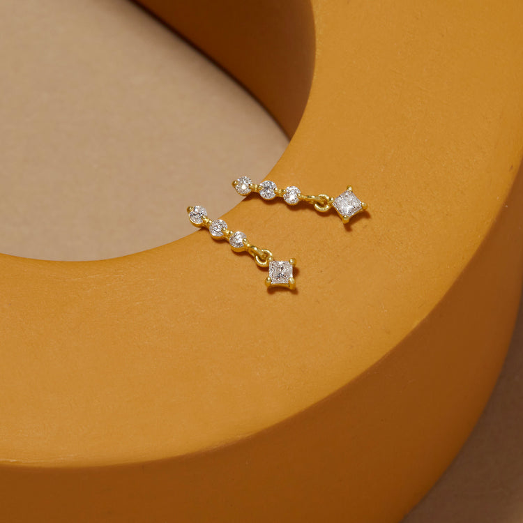 Stone and Strand 10K Yellow Gold Teeny LAB-Created Diamond Line Princess Earrings Editorial Image