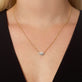Image of 10K Yellow Gold Diamond Muse Solitaire Necklace on Models Neck