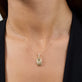 Image of 10K Yellow Gold Diamond Northern Star Locket Necklace on Models Neck