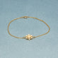 Stone and Strand 10K Yellow Gold Diamond Orbit Bracelet Editorial Image