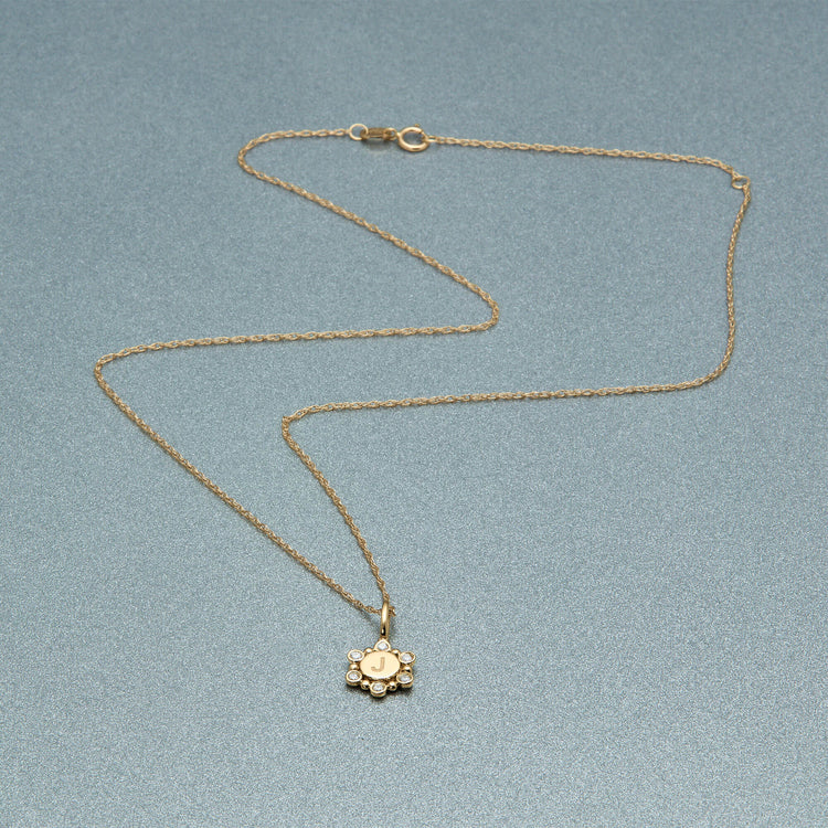 Stone and Strand 10K Yellow Gold Diamond Orbit Mini Medallion Editorial Image