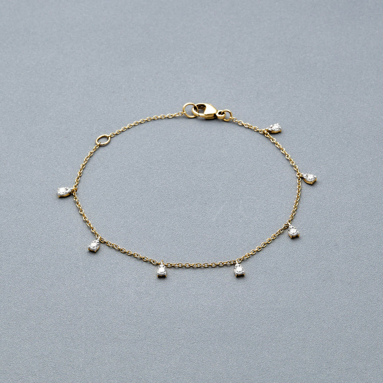 Stone and Strand 14K Yellow Gold Diamond Petal Bracelet Editorial Image