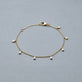 Stone and Strand 14K Yellow Gold Diamond Petal Bracelet Editorial Image