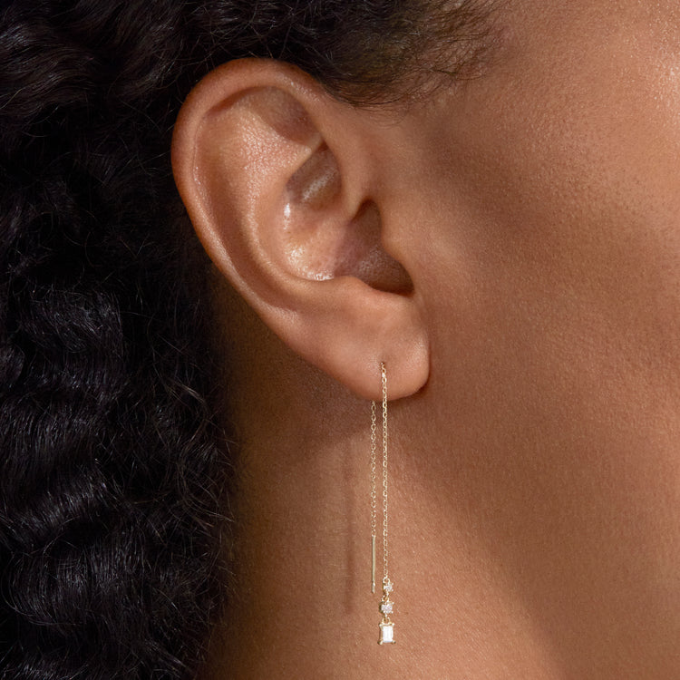 Image of 10K Yellow Gold Diamond Pillar Threaders on Models Ear
