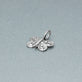 Stone and Strand 10K White Gold Diamond Puff Butterfly Charm Editorial Image