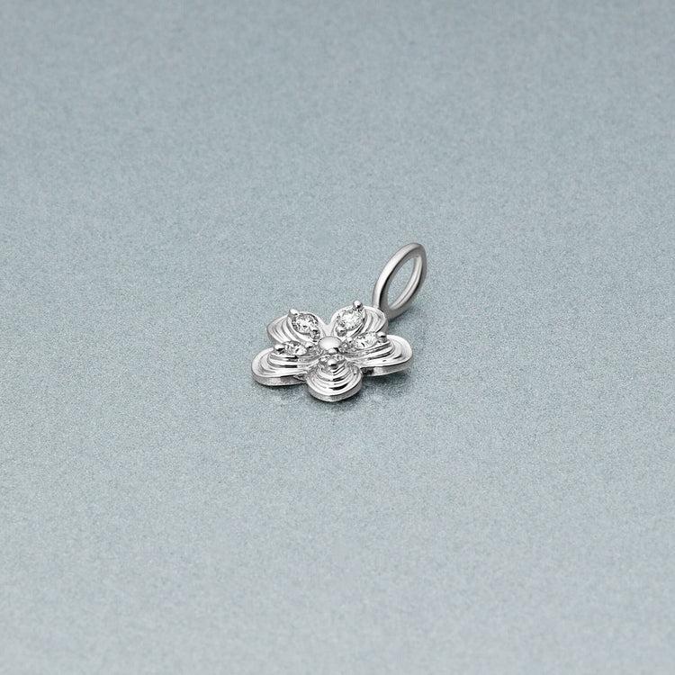 Stone and Strand 10K White Gold Diamond Puff Daisy Charm Editorial Image