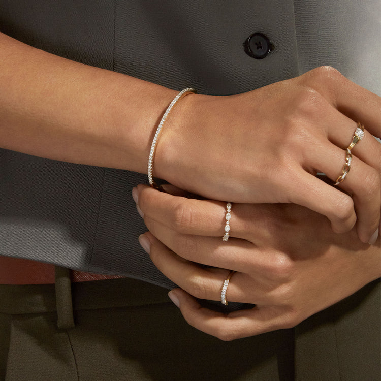 Image of 14K Yellow Gold Diamond Stroke Tennis Bangle on Models Arm