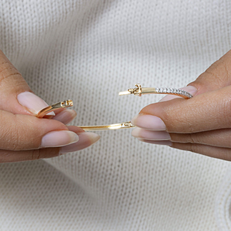 Still life image of Diamond Stroke Tennis Bangle with Stone and Strand solid gold jewelry