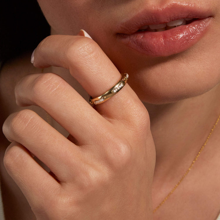 Image of 14K Yellow Gold Diamond Top Stitch Band on Models Hand