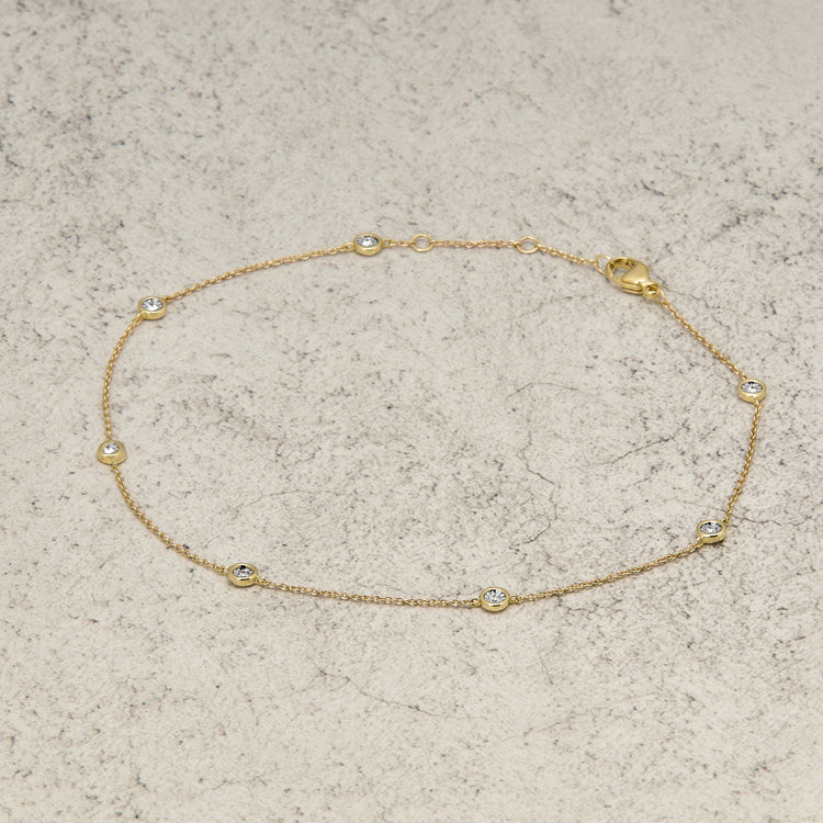 Stone and Strand 10K Yellow Gold Diamonds By The Dozen Anklet Editorial Image