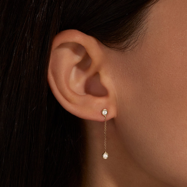 Image of 10K Yellow Gold Diamonds By The Dozen Earrings on Models Ear