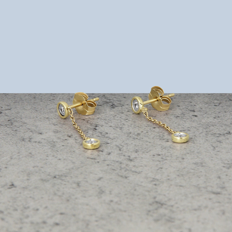 Stone and Strand 10K Yellow Gold Diamonds By The Dozen Earrings Editorial Image