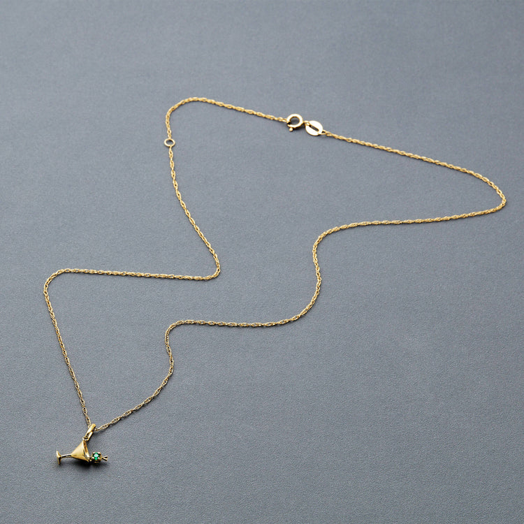 Stone and Strand 10K Yellow Gold Dirty and Flirty Martini Emerald Necklace Editorial Image