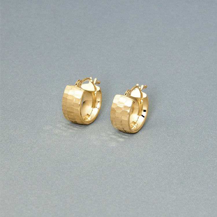 Stone and Strand 14K Yellow Gold Disco Huggies Editorial Image
