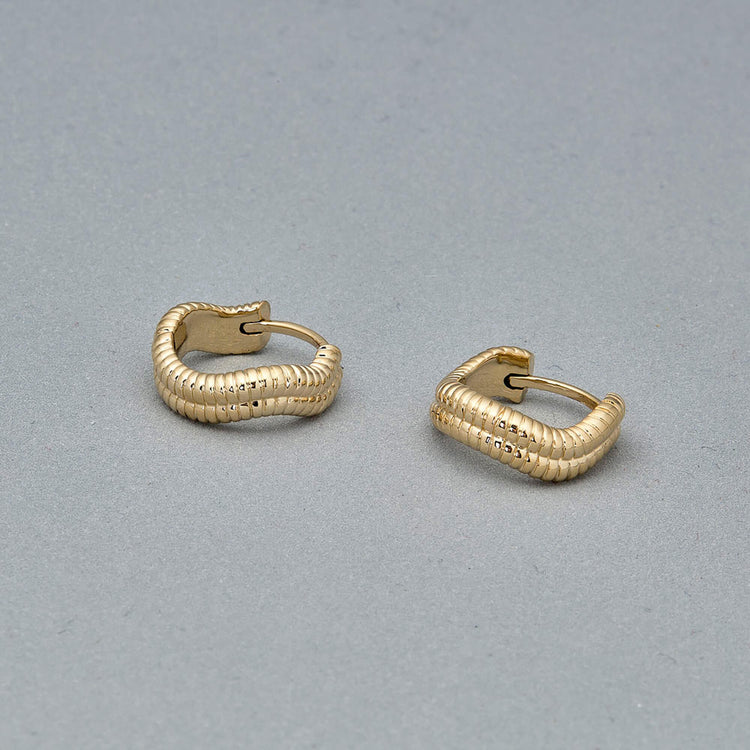 Stone and Strand 14K Yellow Gold Double Freddie Huggies Editorial Image