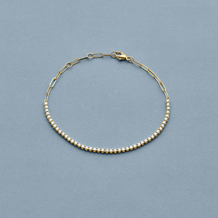 Stone and Strand 10K Yellow Gold Drop Shot Diamond Tennis Bracelet Editorial Image