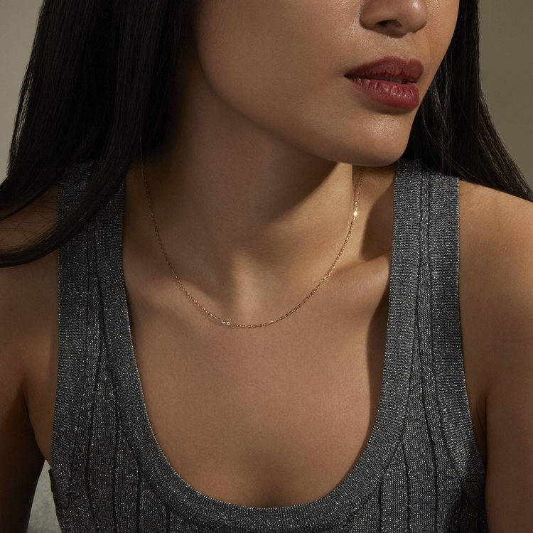 Image of 10K Yellow Gold Dainty Dappled Link Chain on Models Neck