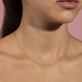 Image of 10K Yellow Gold Diamond Cut Bead Chain on Models Neck