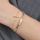 Image of Diamond Toggle Link bracelet On Model with Other Stone And Strand Jewelry