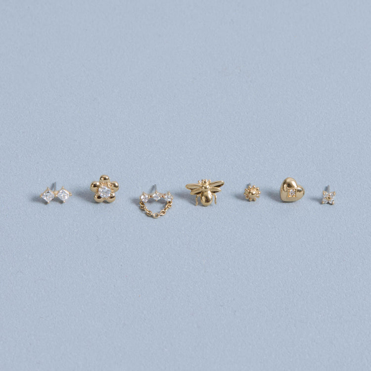 Still life image of Queen Bee Push Pin Flat Back with Stone and Strand solid gold jewelry