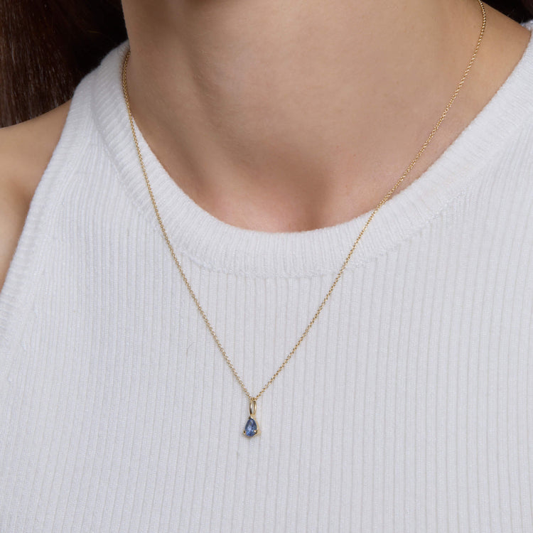Image of 14K Yellow Gold Elegant Pear Birthstone Necklace on Models Neck