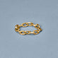 Stone and Strand 14K Yellow Gold Elongated Cable Link Ring Editorial Image