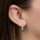Image of 14K Yellow Gold Emerald Luxe Diamond Huggies on Models Ear