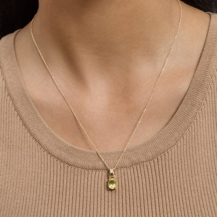 Image of 14K Yellow Gold Empowered Mood Charm on Models Neck