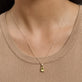 Image of 14K Yellow Gold Empowered Mood Charm on Models Neck