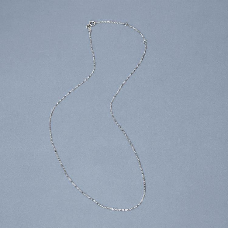 Stone and Strand Essential Adjustable Platinum Cable Chain Necklace Editorial Image