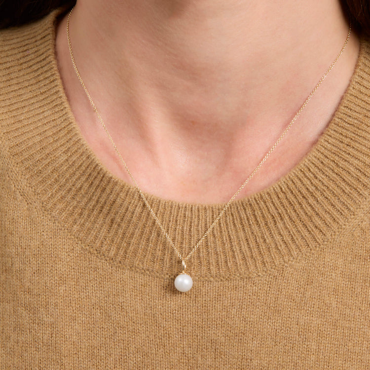 Image of 14K Yellow Gold Essential Pearl Necklace on Models Neck